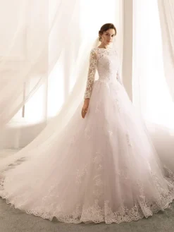 Robe de mariée princess en tulle ivoire manche longue en dentelle boutonné sur dos à traîne ronde Robe de mariage