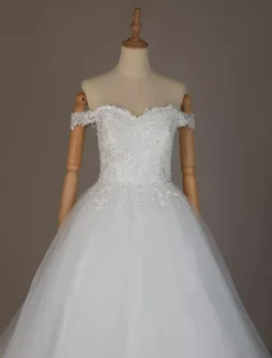 Robe de mariée princesse ivoire en tulle hors de l'épaule jupe plissée à traîne robe de mariage