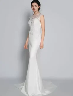 Robe de mariée simple ivoire col rond en dentelle sans manche jupe sirène à traîne Robe de mariage