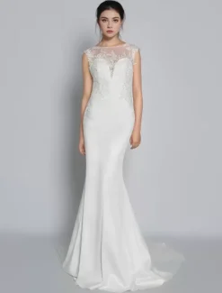 Robe de mariée simple ivoire col rond en dentelle sans manche jupe sirène à traîne Robe de mariage