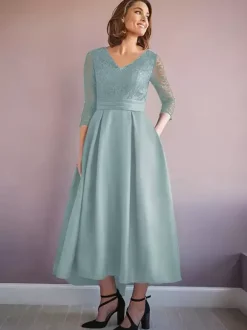 Robe de mère col en V demi-manches trapèze robes d'invitées de mariage perlées