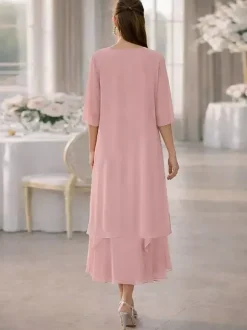 Robe de mère de la mariée deux pièces col rond manches mi-longues coupe trapèze dentelle longueur thé idéale pour un mariage ou une réception.
