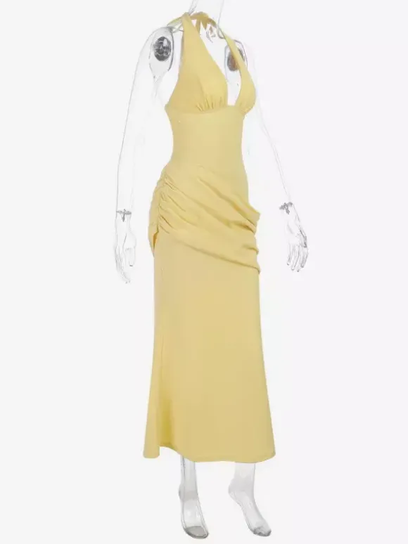 Robe de soirée jaune à col halter et décolleté plongeant style sirène dos lacé et taille froncée