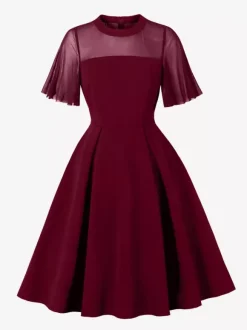 Robe de soirée élégante à manches transparentes et col rond ornée de patchwork en maille collection 2026