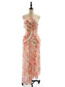 Robe de soirée élégante maxi asymétrique plissée à volants sans manches à imprimé floral et dos nu