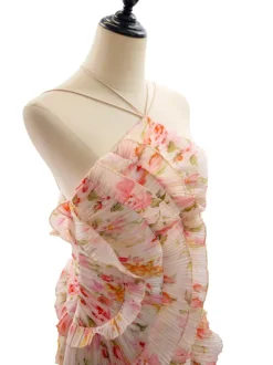 Robe de soirée élégante maxi asymétrique plissée à volants sans manches à imprimé floral et dos nu