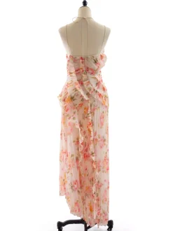 Robe de soirée élégante maxi asymétrique plissée à volants sans manches à imprimé floral et dos nu