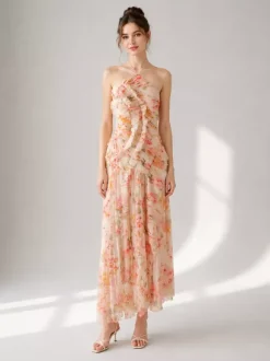 Robe de soirée élégante maxi asymétrique plissée à volants sans manches à imprimé floral et dos nu