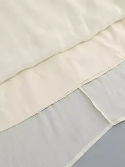 Robe de soirée longue abricot sans bretelles dos nu chic et semi-formelle