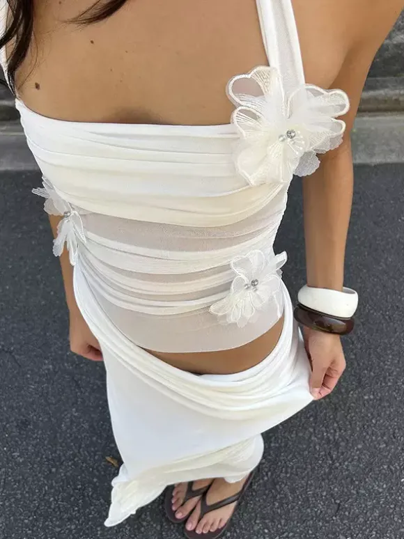 Robe de soirée maxi bleue à fleurs sans manches sexy et semi-formelle idéale pour l'été.