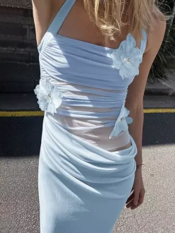 Robe de soirée maxi bleue à fleurs sans manches sexy et semi-formelle idéale pour l'été.