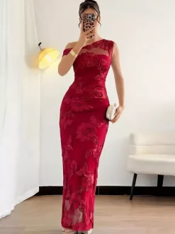 Robe de soirée maxi élégante noire asymétrique à une épaule en résille florale 3D coupe sirène moulante.