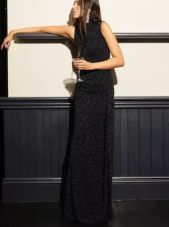 Robe de soirée maxi noire dos nu ceinturée chic et semi-formelle