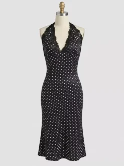 Robe de soirée midi noire à pois dos nu sans manches style semi-formel idéale pour l'été.