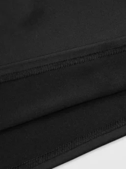 Robe de soirée noire moulante mini à dos nu et ornée de rivets tenue de boîte de nuit