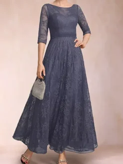 Robe de soirée pour la mère de la mariée col rond manches 3/4 coupe trapèze dentelle longueur cheville idéale pour les invitées de mariage.