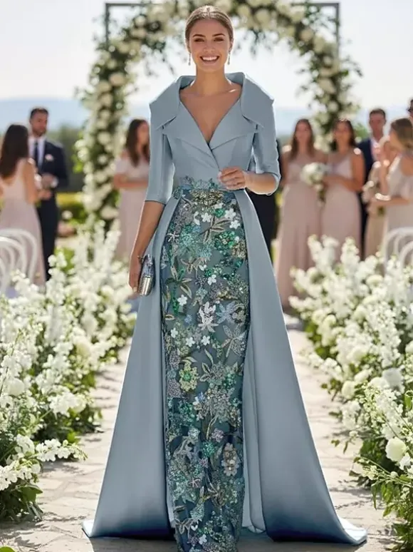 Robe de soirée pour la mère de la mariée col en V manches 3/4 coupe trapèze en dentelle idéale pour un mariage.