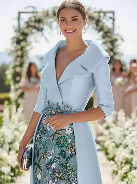 Robe de soirée pour la mère de la mariée col en V manches 3/4 coupe trapèze en dentelle idéale pour un mariage.