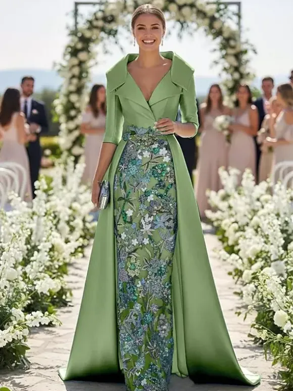 Robe de soirée pour la mère de la mariée col en V manches 3/4 coupe trapèze en dentelle idéale pour un mariage.