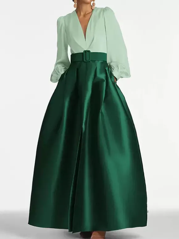 Robe de soirée princesse décolleté en V manches longues fermeture éclair ceinture en satin.