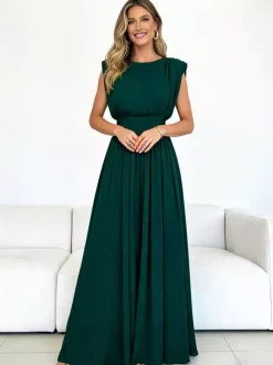 Robe de soirée vert émeraude cintrée et élégante avec jupe plissée parfaite pour les événements formels.