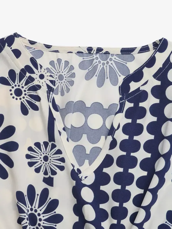 Robe de vacances fluide vintage à fleurs col en V manches bouffantes