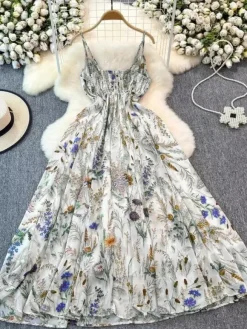 Robe de vacances maxi dos nu à fleurs bretelles fines sans manches imprimé floral col chic couleur abricot