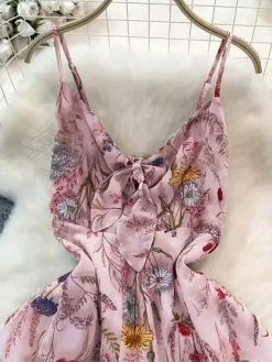 Robe de vacances maxi dos nu à fleurs bretelles fines sans manches imprimé floral col chic couleur abricot