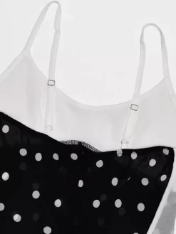 Robe de vacances maxi sans manches à pois col en V robe noire sexy