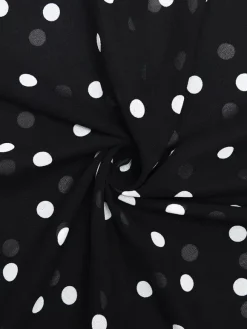 Robe de vacances maxi sans manches à pois col en V robe noire sexy