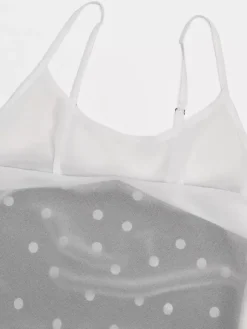 Robe de vacances maxi sans manches à pois col en V robe noire sexy