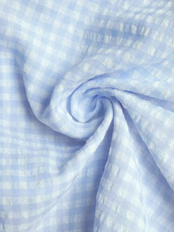 Robe d'été bleue mini à lacets sans manches et dos nu longueur genou idéale pour une soirée en amoureux