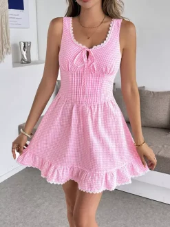 Robe d'été bleue mini à lacets sans manches et dos nu longueur genou idéale pour une soirée en amoureux