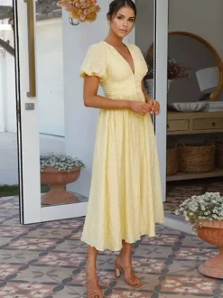 Robe d'été jaune beurre à manches bouffantes et décolleté plongeant robe longue décontractée d'été 2026