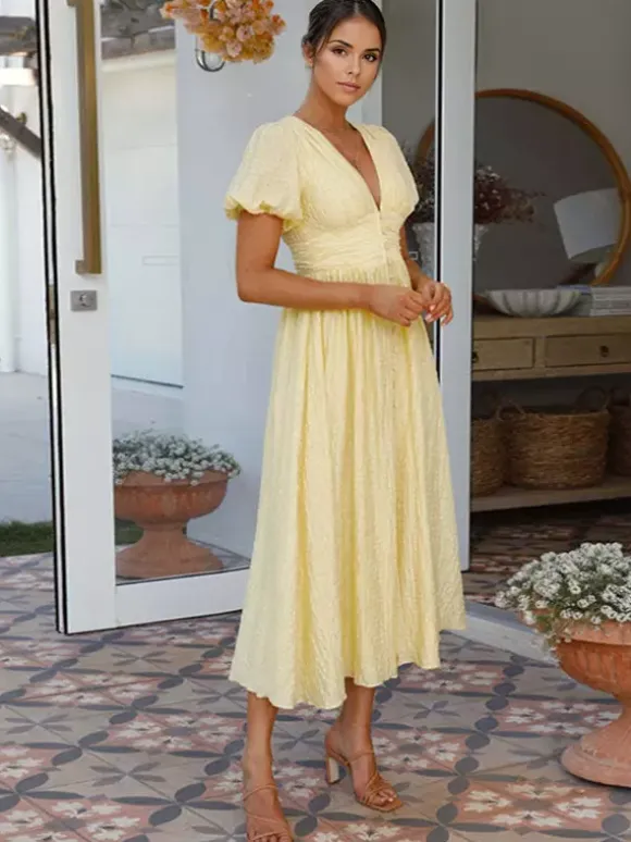 Robe d'été jaune beurre à manches bouffantes et décolleté plongeant robe longue décontractée d'été 2026