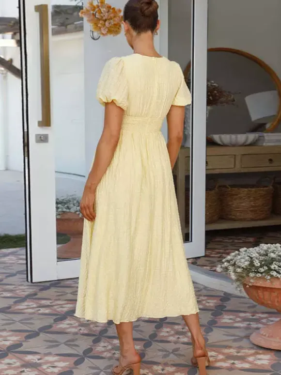 Robe d'été jaune beurre à manches bouffantes et décolleté plongeant robe longue décontractée d'été 2026
