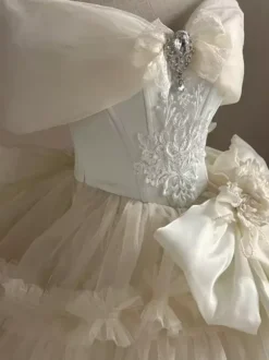 Robe Fairy Lolita Champagne à n艙ud sur le devant épaules dénudées style tea party.