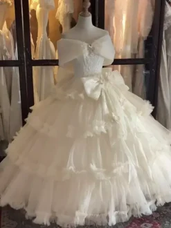 Robe Fairy Lolita Champagne à n艙ud sur le devant épaules dénudées style tea party.