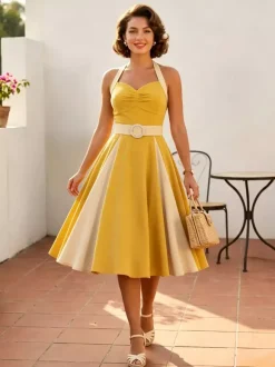 Robe jaune dos nu vintage swing avec ceinture blanche contrastante style rockabilly rétro années 50