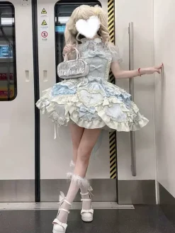 Robe Lolita Douce Ballet dos nu sans manches à volants et lacets bleue avec traîne
