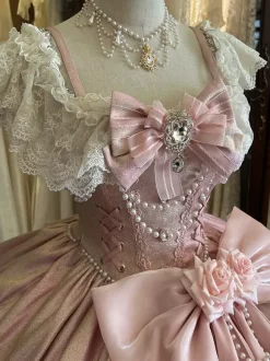 Robe Lolita féerique rose robe de bal ornée de perles et de fleurs n艙ud dans le dos bandage en dentelle manches en dentelle.