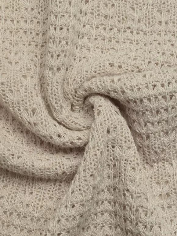 Robe longue bustier beige en maille crochet pour femme ornée d'étoiles de mer avec découpe en forme de goutte et fente latérale. Robe d'été idéale pour la plage.