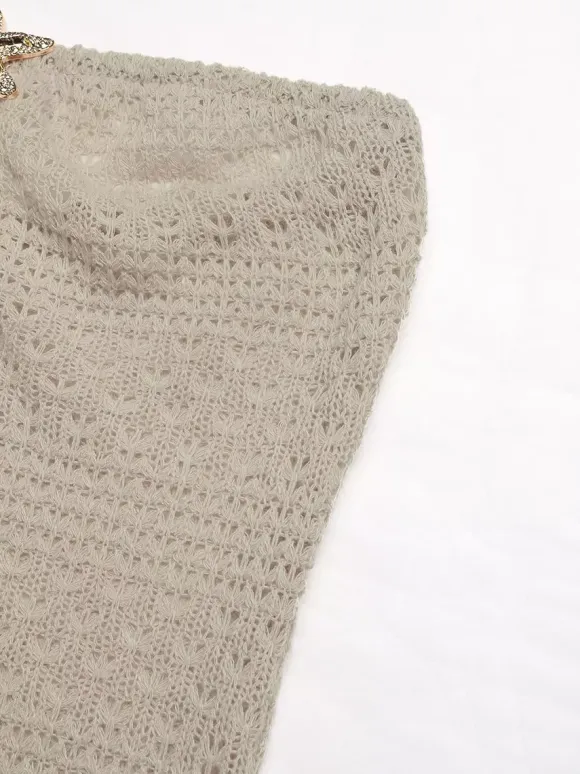 Robe longue bustier beige en maille crochet pour femme ornée d'étoiles de mer avec découpe en forme de goutte et fente latérale. Robe d'été idéale pour la plage.