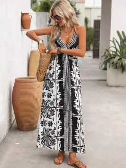 Robe longue dos nu à imprimé tropical noir et blanc pour femme col en V sans manches fluide idéale pour l'été et la plage