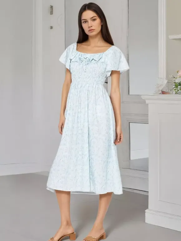 Robe longue d'été douce imprimée à fleurs col carré manches courtes et dos nu à encolure carrée.