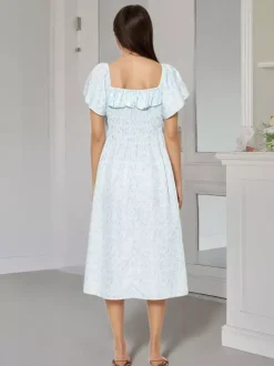 Robe longue d'été douce imprimée à fleurs col carré manches courtes et dos nu à encolure carrée.