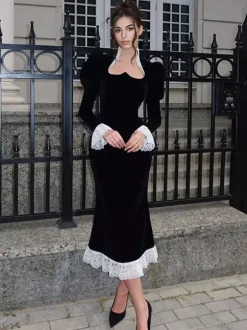 Robe longue élégante en velours noir avec détails en dentelle manches longues pour femme collection printemps 2026