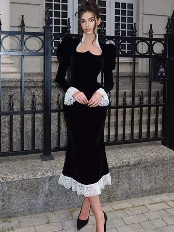 Robe longue élégante en velours noir avec détails en dentelle manches longues pour femme collection printemps 2026