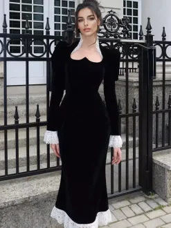 Robe longue élégante en velours noir avec détails en dentelle manches longues pour femme collection printemps 2026