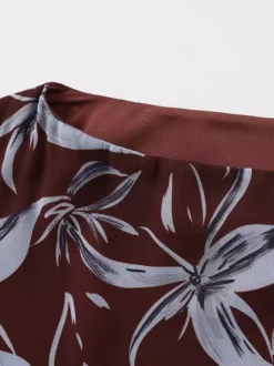 Robe longue moulante rétro à manches longues et imprimé floral coupe ajustée collection 2026